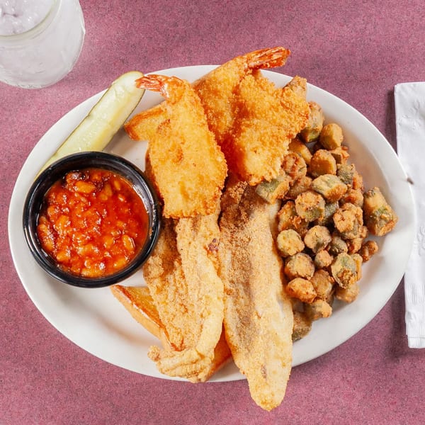Jerry Neel's fried catfish and shrimp platter with baked beans, fried okra, and a pickle spear.